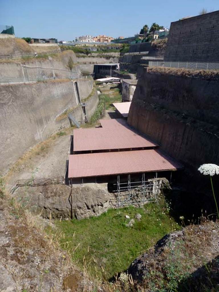 House of Dionysiac Reliefs, Herculaneum, seaside pavilion, at east end of Villa dei Papiri site, June 2014. Looking west to collapsed front.
Photo courtesy of Michael Binns.